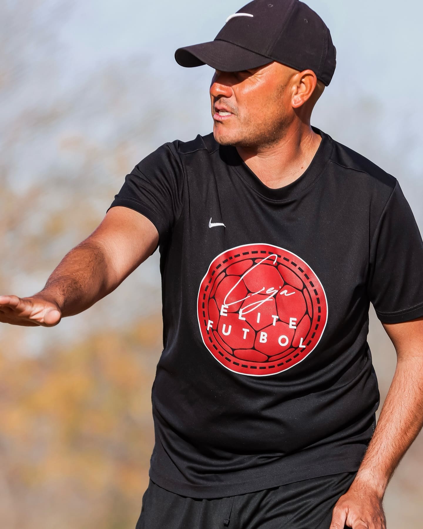 Coach Ceja giving instructions mid-drill